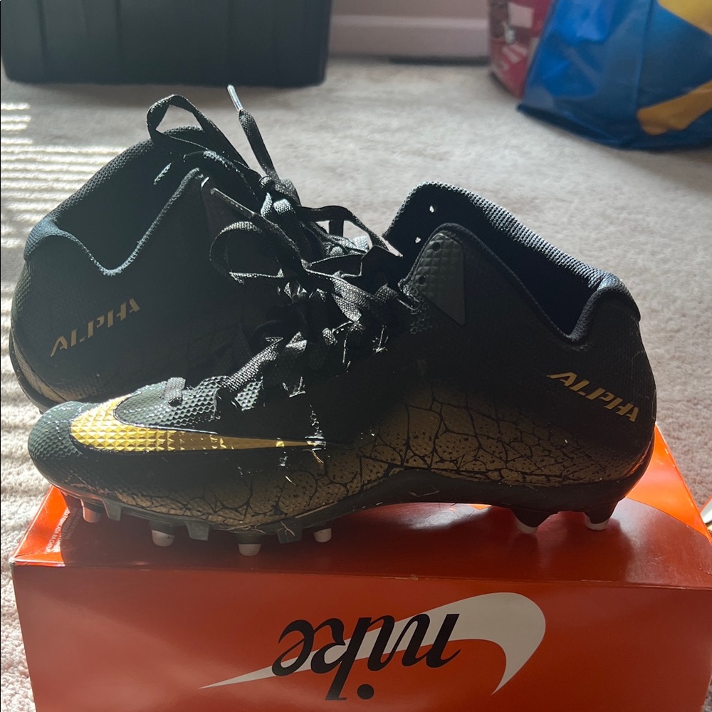 Nike Alpha Black and Gold Cleats
